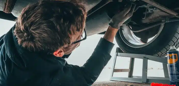 Man Fixing Vehicle Engine